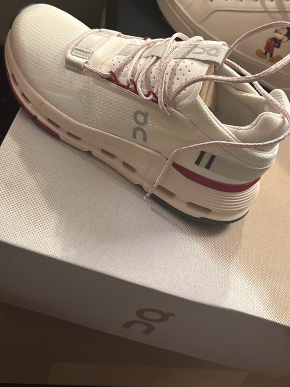 On Running Cloudnova White Sneakers with Pink Accents